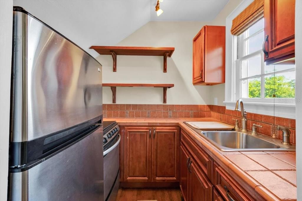 Interior, Kitchen, Tile Countertops, Wood Texture Flooring