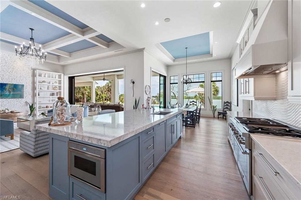 Chandelier, Interior, Kitchen, Pendant Lights, Recessed Lighting, Stainless Steel Appliances, Wood Texture Flooring