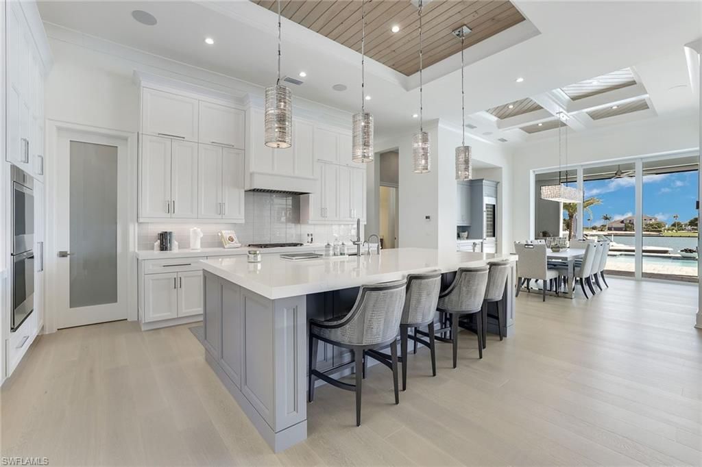 Dining room, Interior, Kitchen, Pendant Lights, Recessed Lighting, Stainless Steel Appliances, Water, Wooden Ceilings, Wood Texture Flooring