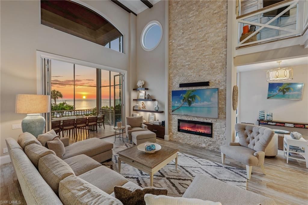 Dining room, Fireplace, Interior, Living room, Stone Walls, Water, Wood Texture Flooring
