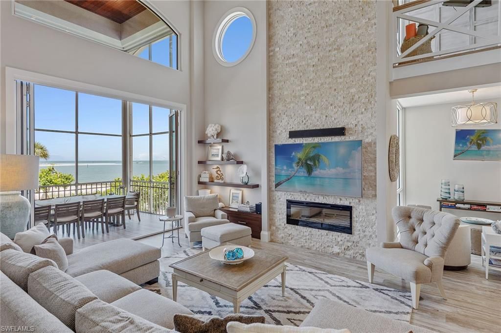 Dining room, Fireplace, Interior, Living room, Pendant Lights, Stone Walls, Water, Wood Texture Flooring