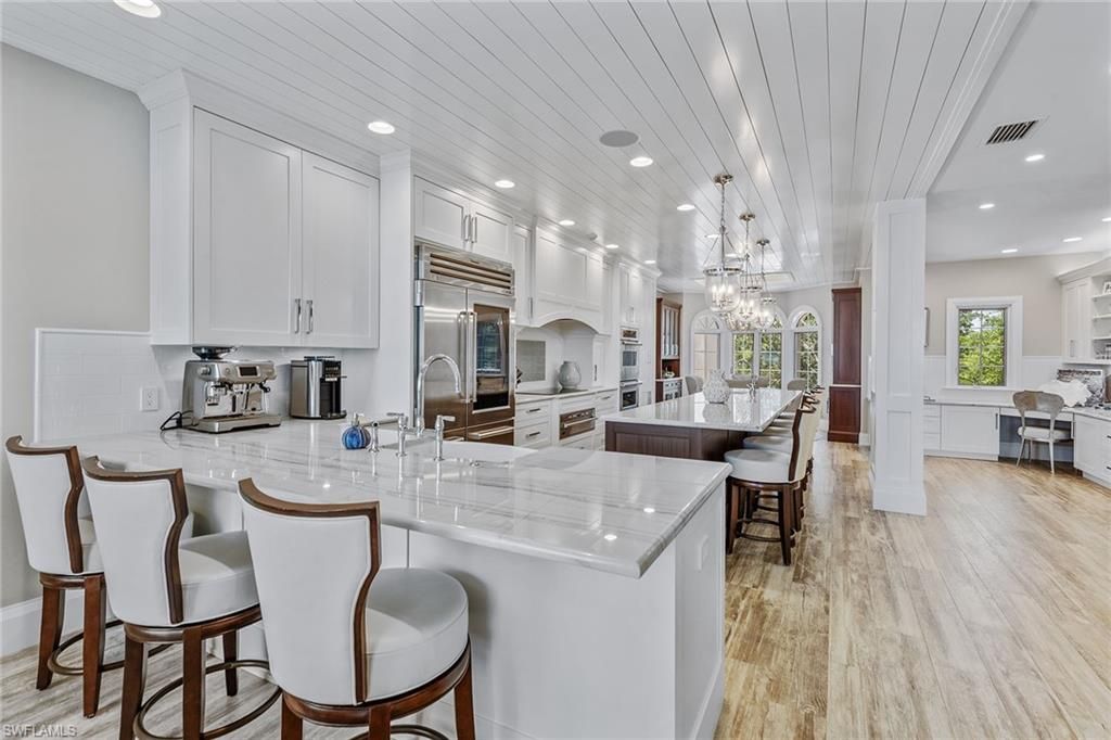 Chandelier, Interior, Kitchen, Pendant Lights, Recessed Lighting, Stainless Steel Appliances, Wood Texture Flooring