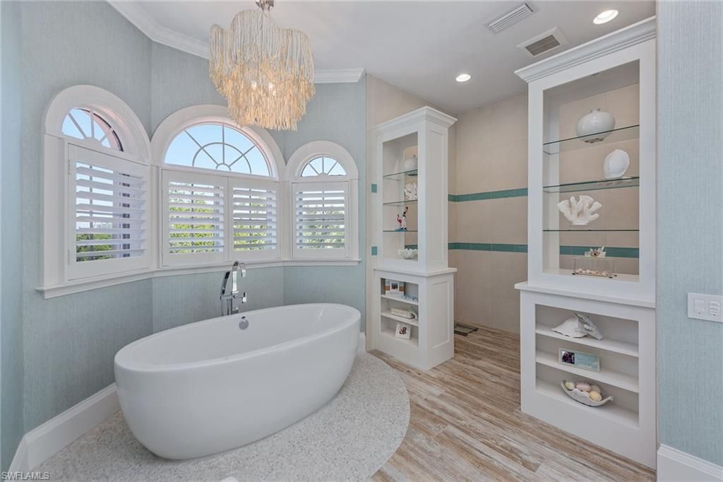 Bathroom, Chandelier, Free Standing Baths, Interior, Recessed Lighting, Wood Texture Flooring
