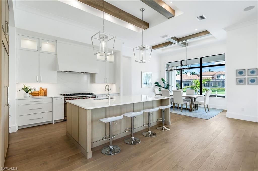 Dining room, Interior, Kitchen, Pendant Lights, Recessed Lighting, Stainless Steel Appliances, Wooden Beams, Wood Texture Flooring