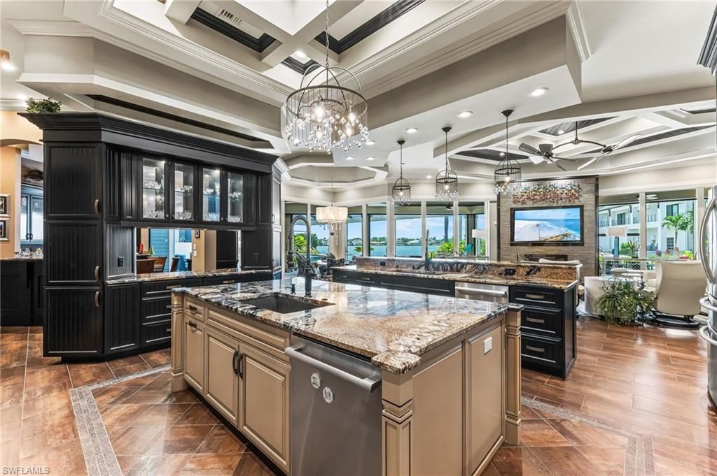 Chandelier, Interior, Kitchen, Living room, Pendant Lights, Recessed Lighting, Stainless Steel Appliances, Water, Wood Texture Flooring
