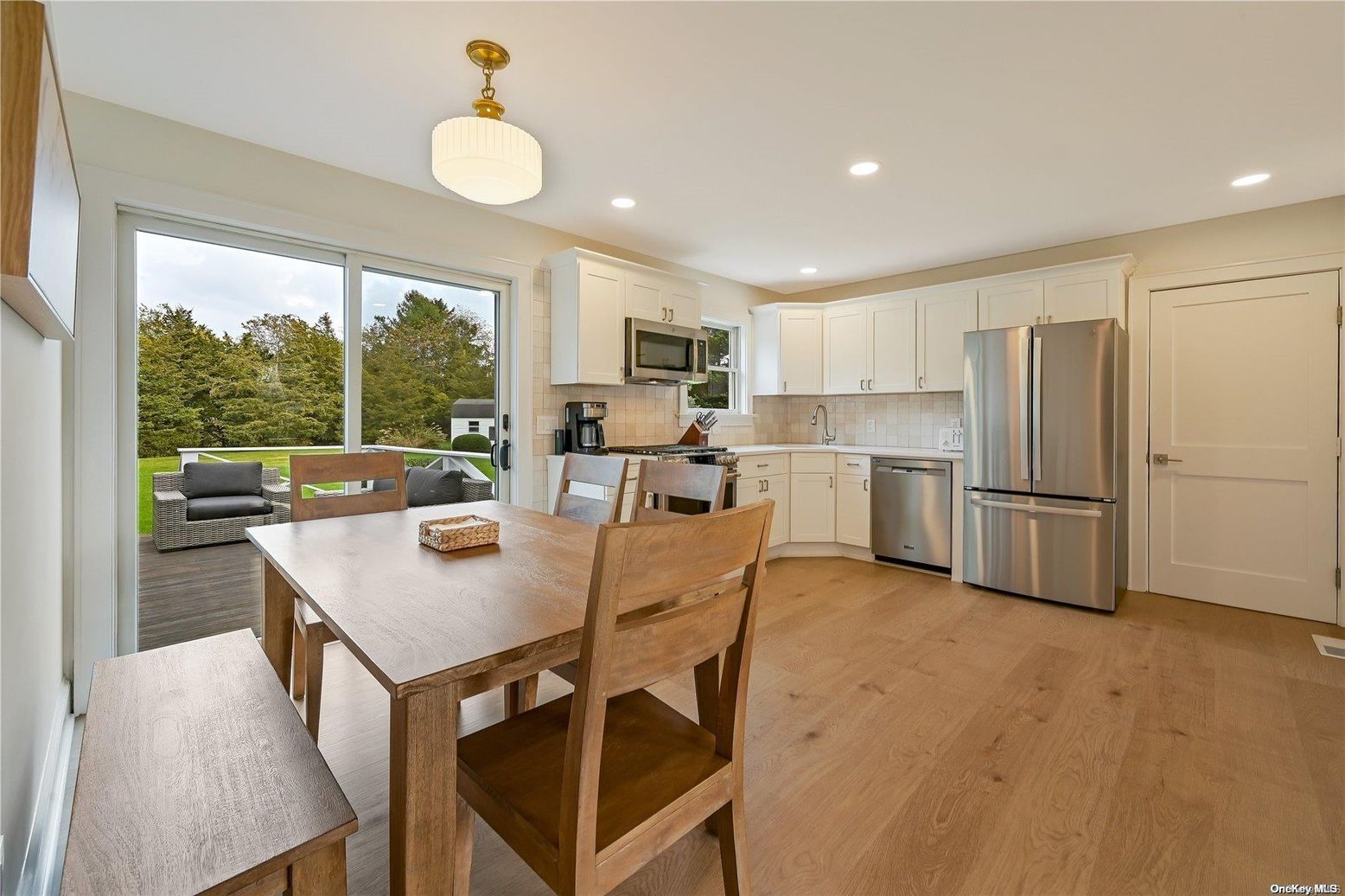 Dining room, Interior, Kitchen, Recessed Lighting, Stainless Steel Appliances, Wood Texture Flooring