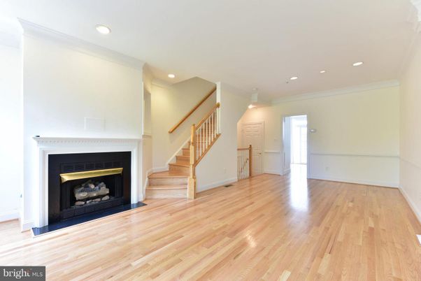 Empty room, Fireplace, Interior, Pendant Lights, Recessed Lighting, Wood Texture Flooring