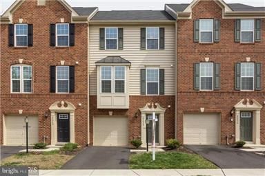 Attached, Exterior, Facade, Brick Facade, Rowhouse