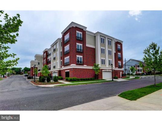 Attached, Exterior, Facade, Brick Facade, Condo Building