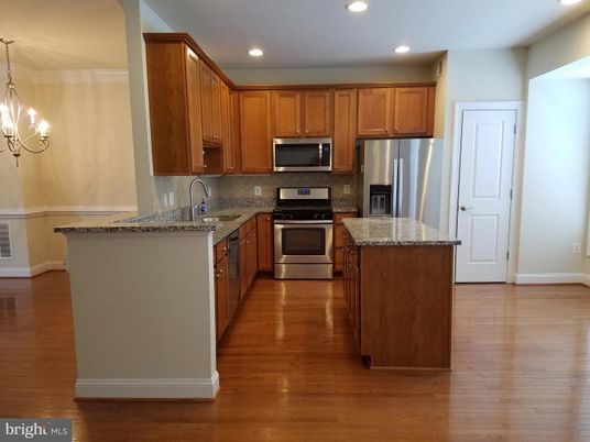 Chandelier, Interior, Kitchen, Recessed Lighting, Stainless Steel Appliances, Wood Texture Flooring