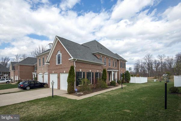 Attached, Backyard, Exterior, Facade, Brick Facade, Brick Traditional