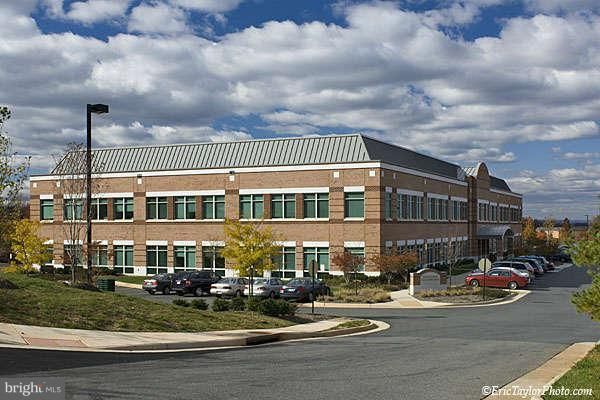 Exterior, Facade, Brick Facade, Condo Building