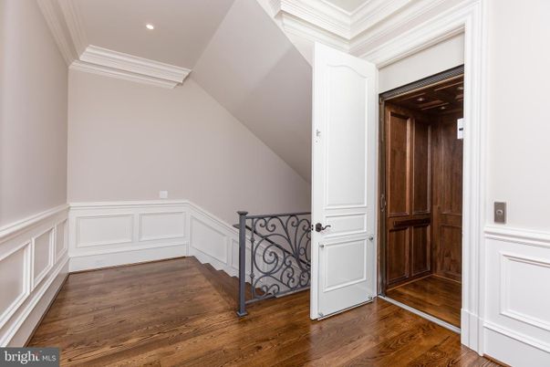 Elevator, Interior, Recessed Lighting, Wood Texture Flooring, Wooden Walls
