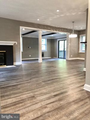 Empty room, Fireplace, Interior, Pendant Lights, Recessed Lighting, Wood Texture Flooring