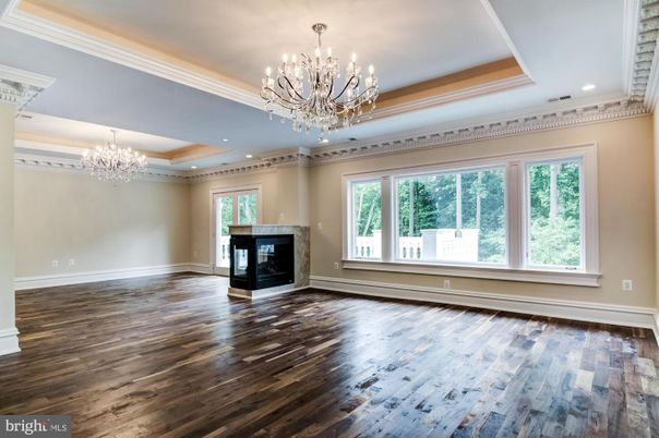 Chandelier, Empty room, Fireplace, Interior, Recessed Lighting, Wood Texture Flooring
