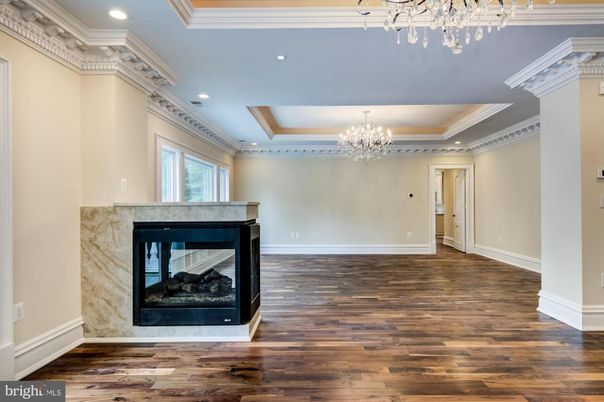 Chandelier, Empty room, Fireplace, Interior, Recessed Lighting, Wood Texture Flooring