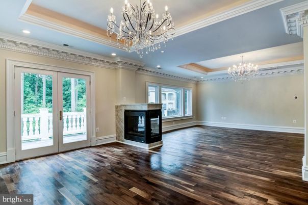 Chandelier, Empty room, Fireplace, Interior, Recessed Lighting, Wood Texture Flooring