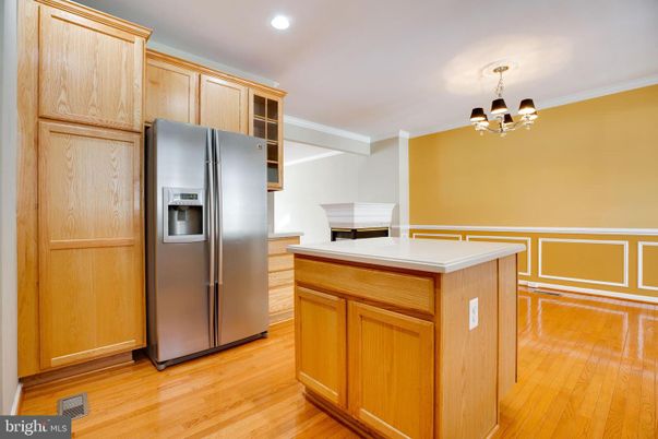 Chandelier, Interior, Kitchen, Recessed Lighting, Stainless Steel Appliances, Wood Texture Flooring