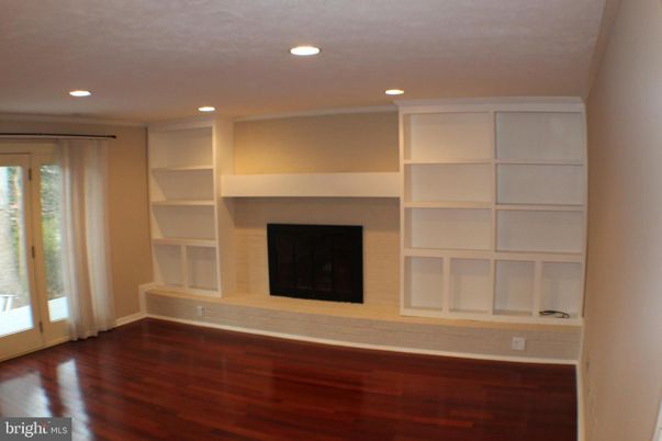 Empty room, Fireplace, Interior, Recessed Lighting, Wood Texture Flooring