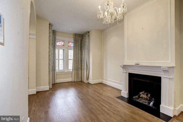 Chandelier, Empty room, Fireplace, Interior, Recessed Lighting, Wood Texture Flooring