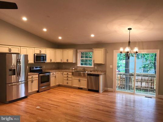 Chandelier, Interior, Kitchen, Recessed Lighting, Stainless Steel Appliances, Wood Texture Flooring