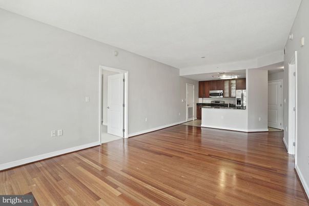Empty room, Interior, Kitchen, Stainless Steel Appliances, Wood Texture Flooring