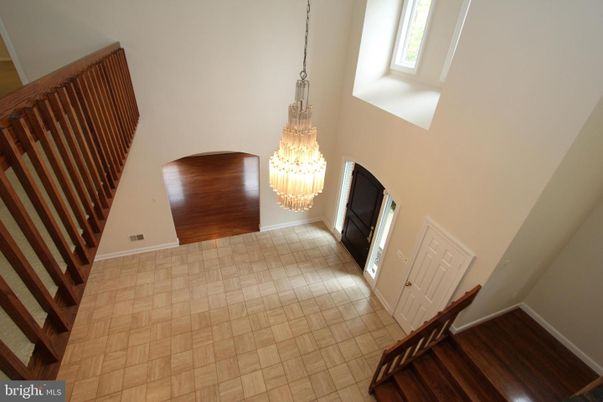 Chandelier, Empty room, Fireplace, Interior