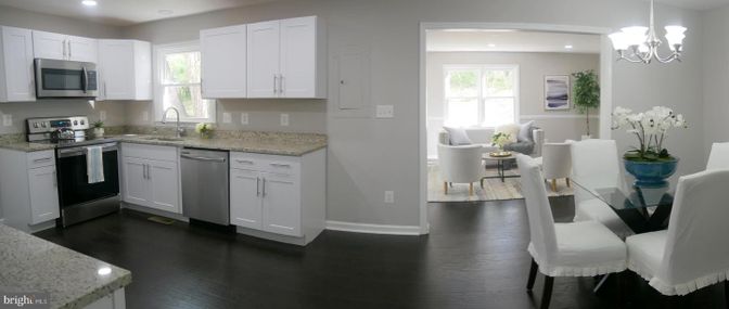 Chandelier, Dining room, Interior, Kitchen, Recessed Lighting, Stainless Steel Appliances, Wood Texture Flooring