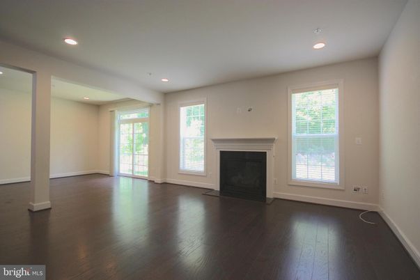 Empty room, Fireplace, Interior, Recessed Lighting, Wood Texture Flooring