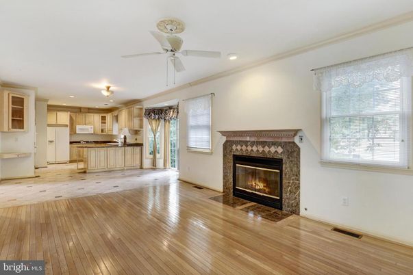 Empty room, Fireplace, Interior, Kitchen, Recessed Lighting, Wood Texture Flooring