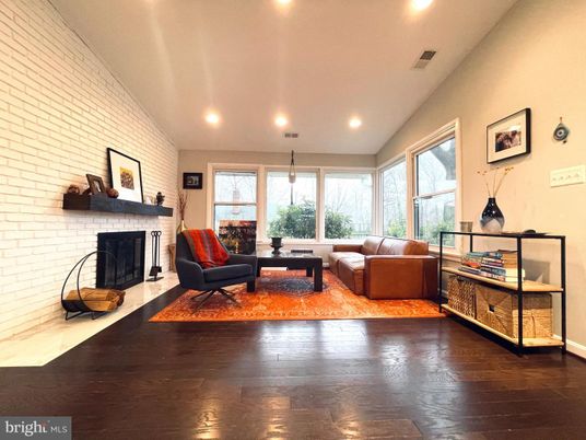 Fireplace, Interior, Living room, Pendant Lights, Recessed Lighting, Stone Walls, Wood Texture Flooring