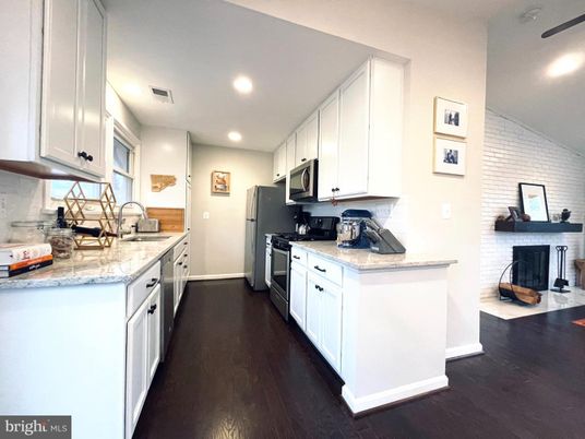 Fireplace, Interior, Kitchen, Recessed Lighting, Wood Texture Flooring