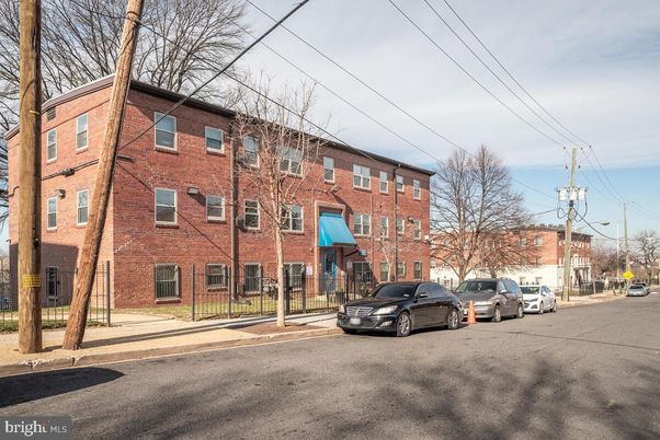 Exterior, Facade, Brick Facade, Condo Building