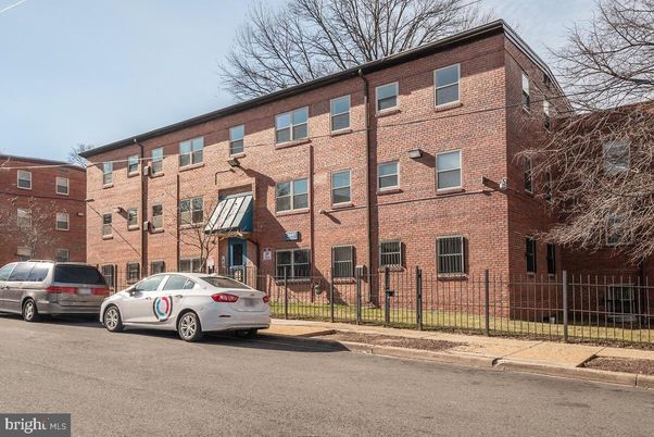 Exterior, Facade, Brick Facade, Condo Building