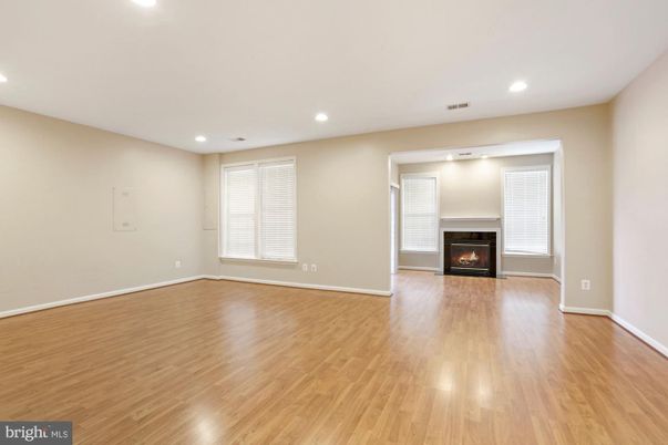 Empty room, Fireplace, Interior, Recessed Lighting, Wood Texture Flooring