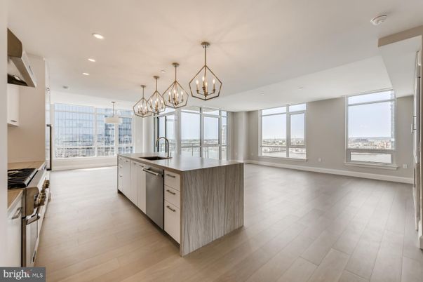 Chandelier, Interior, Kitchen, Pendant Lights, Recessed Lighting, Stainless Steel Appliances, Wood Texture Flooring