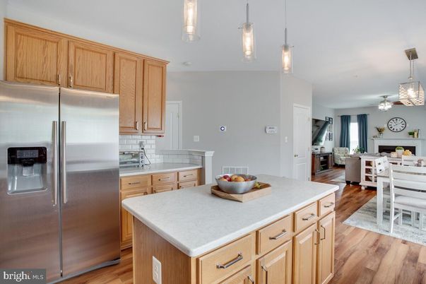 Dining room, Interior, Kitchen, Pendant Lights, Stainless Steel Appliances, Wood Texture Flooring