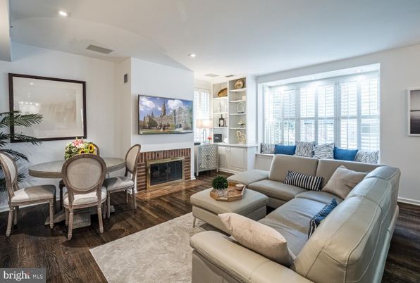 Dining room, Fireplace, Interior, Living room, Recessed Lighting, Wood Texture Flooring
