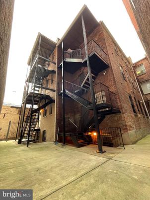 Exterior, Facade, Brick Facade, Condo Building
