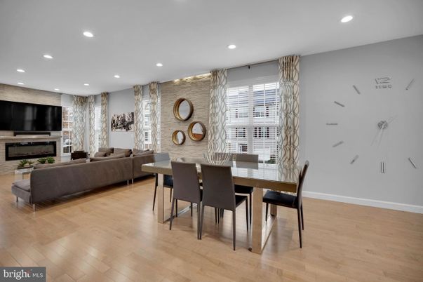 Dining room, Fireplace, Interior, Living room, Recessed Lighting, Wood Texture Flooring
