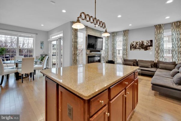 Dining room, Fireplace, Interior, Kitchen, Living room, Pendant Lights, Recessed Lighting, Wood Texture Flooring