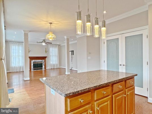 Empty room, Fireplace, Interior, Pendant Lights, Recessed Lighting, Wood Texture Flooring