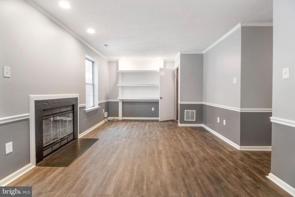Empty room, Fireplace, Interior, Recessed Lighting, Wood Texture Flooring
