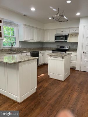Chandelier, Interior, Kitchen, Recessed Lighting, Stainless Steel Appliances, Wood Texture Flooring