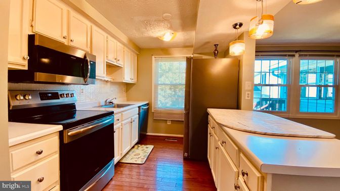 Interior, Kitchen, Pendant Lights, Stainless Steel Appliances, Wood Texture Flooring