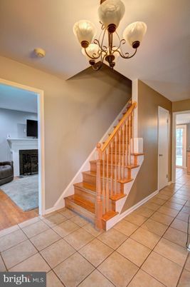 Chandelier, Fireplace, Interior, Wood Texture Flooring