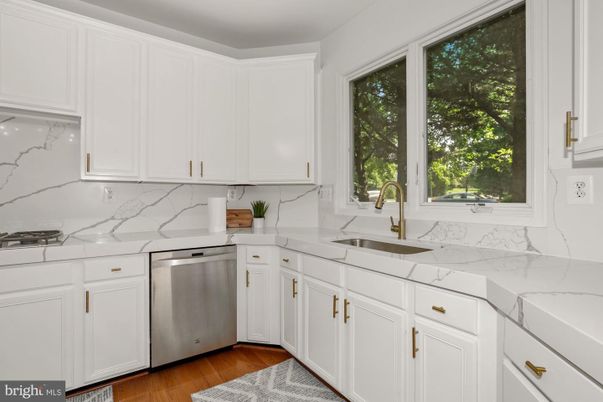 Interior, Kitchen, Marble Walls, Stainless Steel Appliances, Wood Texture Flooring