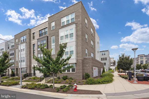Exterior, Facade, Brick Facade, Condo Building