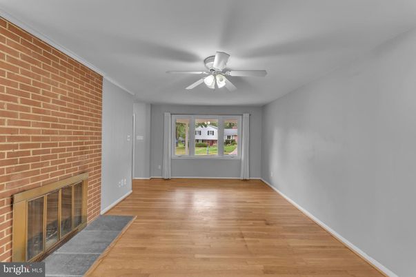 Empty room, Fireplace, Interior, Stone Walls, Wood Texture Flooring