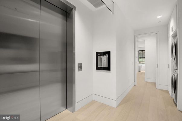 Elevator, Interior, Recessed Lighting, Washer, Wood Texture Flooring